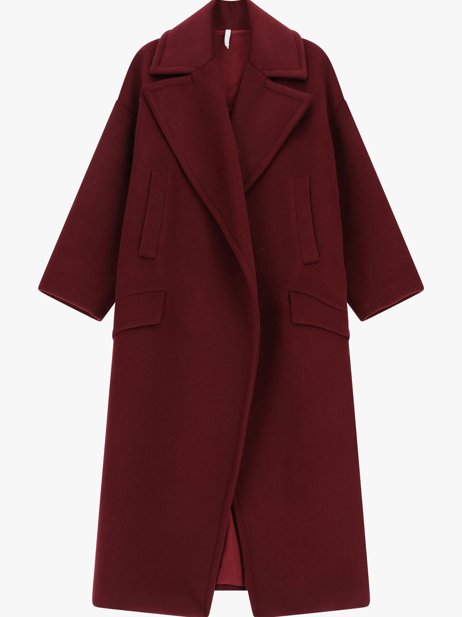 Cappotto lungo con rever oversize e tasche a filetto