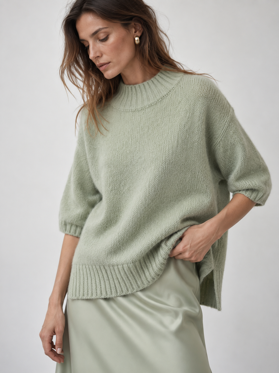 Maglione a maniche corte con collo polo ampio bordo