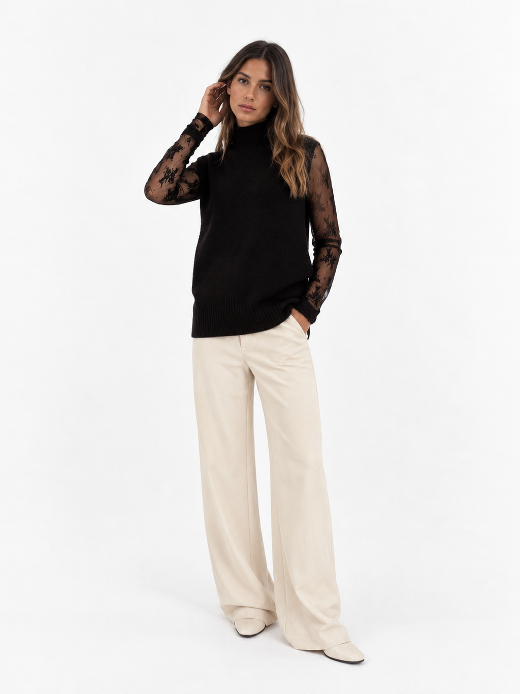Maglia smanicata con collo alto lavorato
