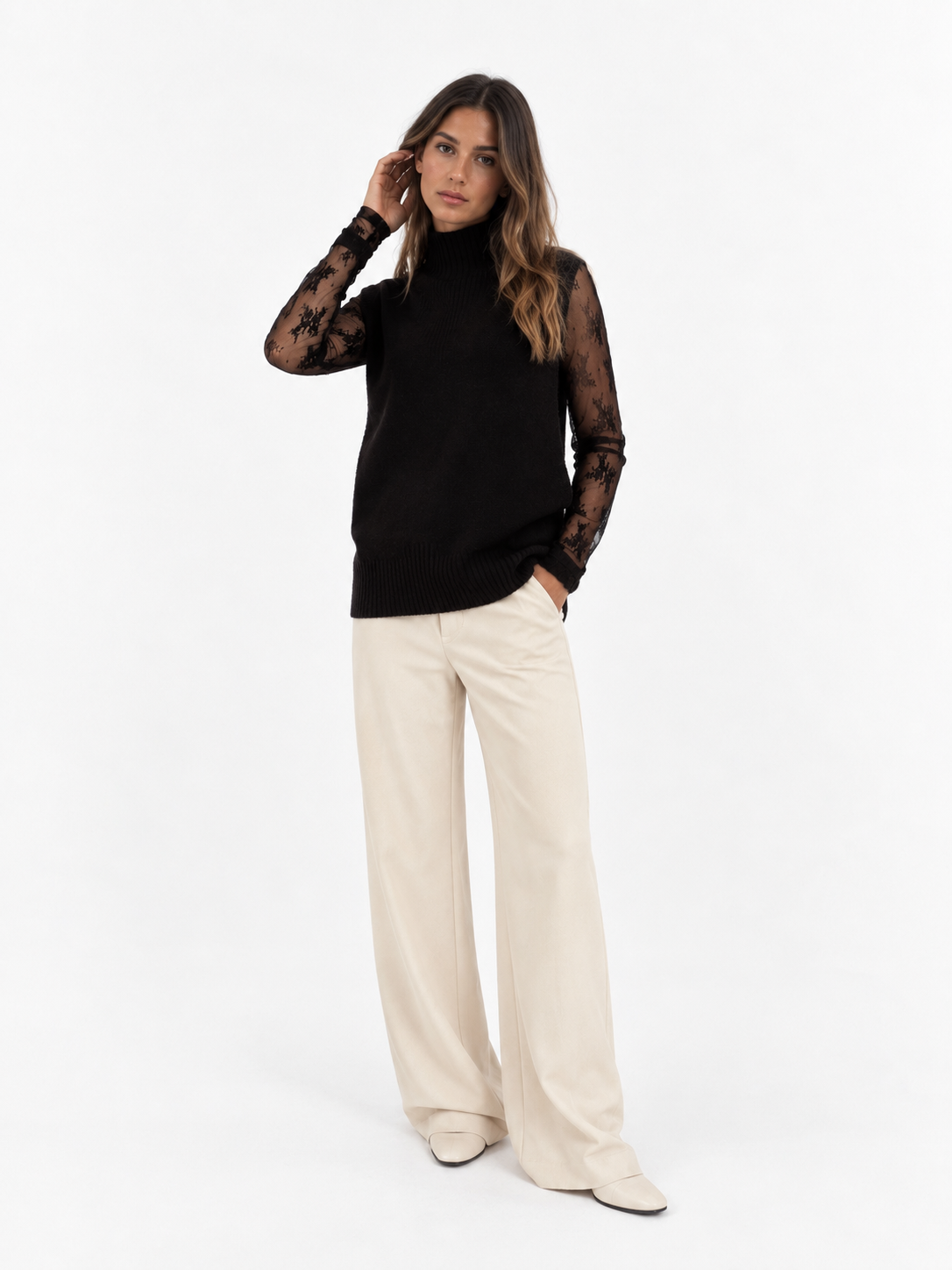Maglia smanicata con collo alto lavorato