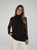 Maglia smanicata con collo alto lavorato