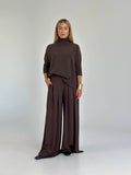 Pantaloni palazzo a vita alta con pinces e cintura